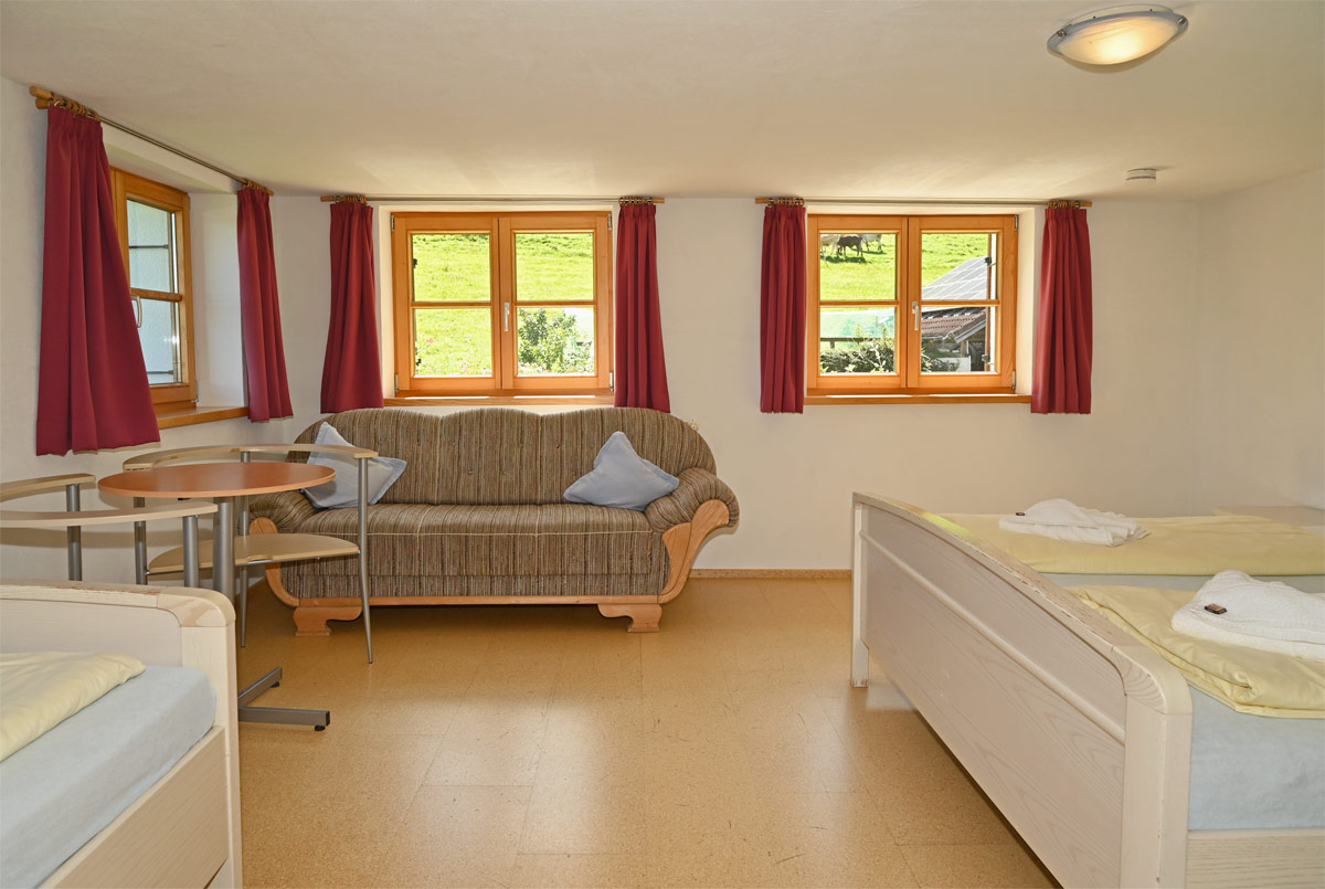 Schlafzimmer mit Sitzecke